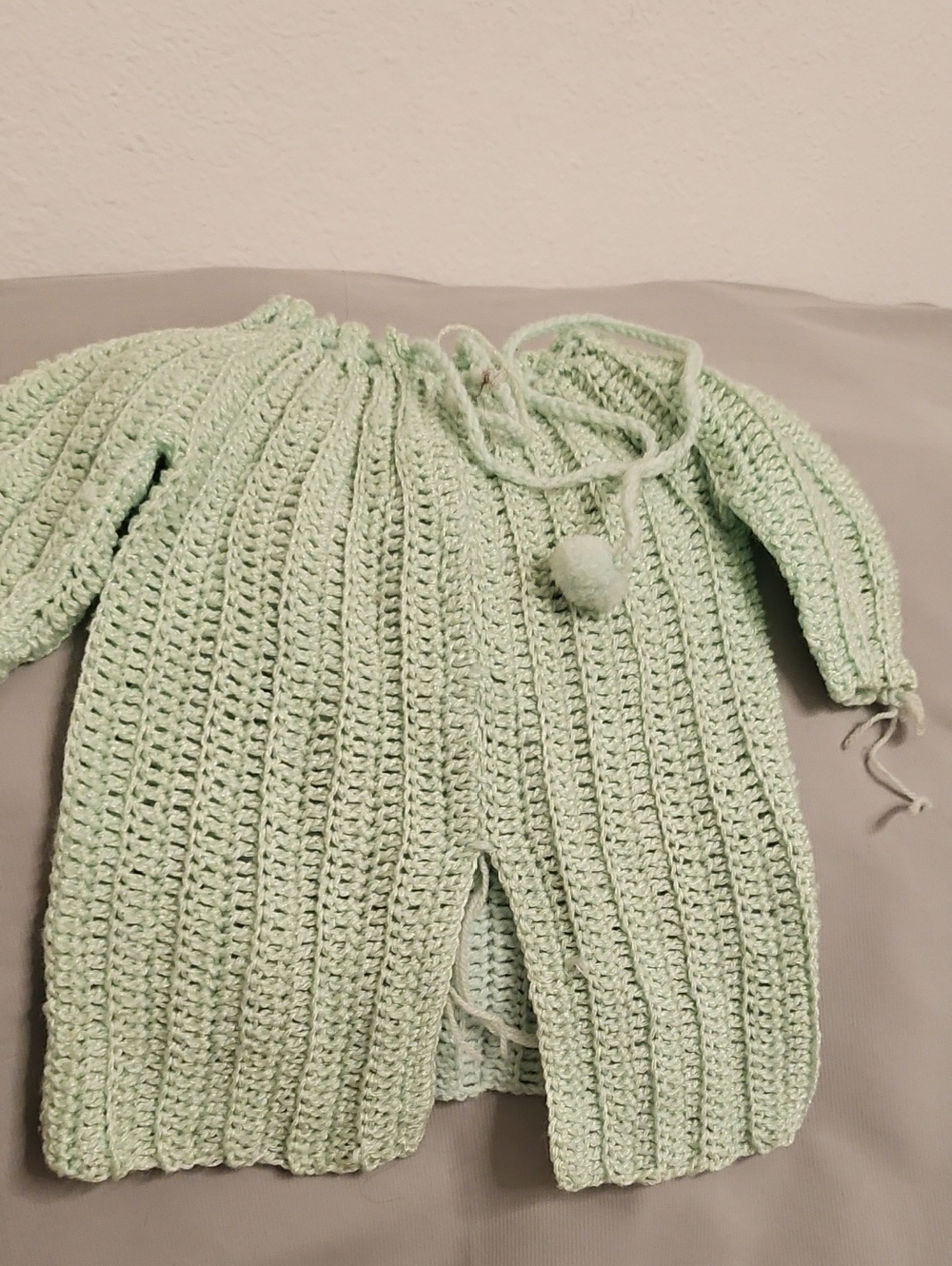 Handmade Mint Green Crochet Baby Romper with Pom Tie. Unfinish Crochet.